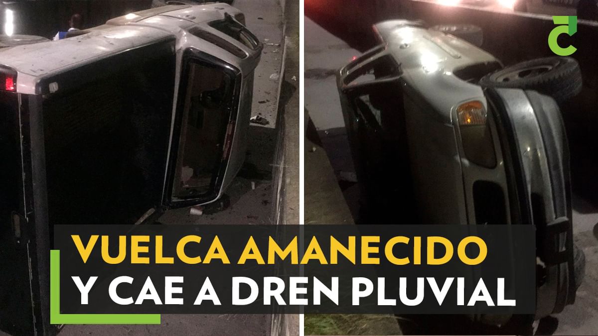 Conductor ebrio vuelca camioneta y cae a dren pluvial